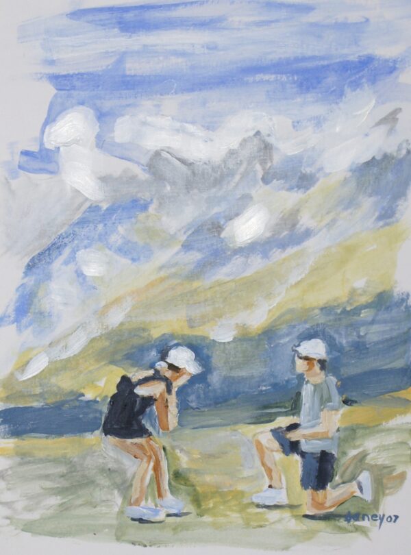 Couple in hats at mountain vista.